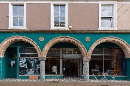 The teal arched shopfront of 25 Newmarket Street, Ayr, reopened as The Auld Toy Shop